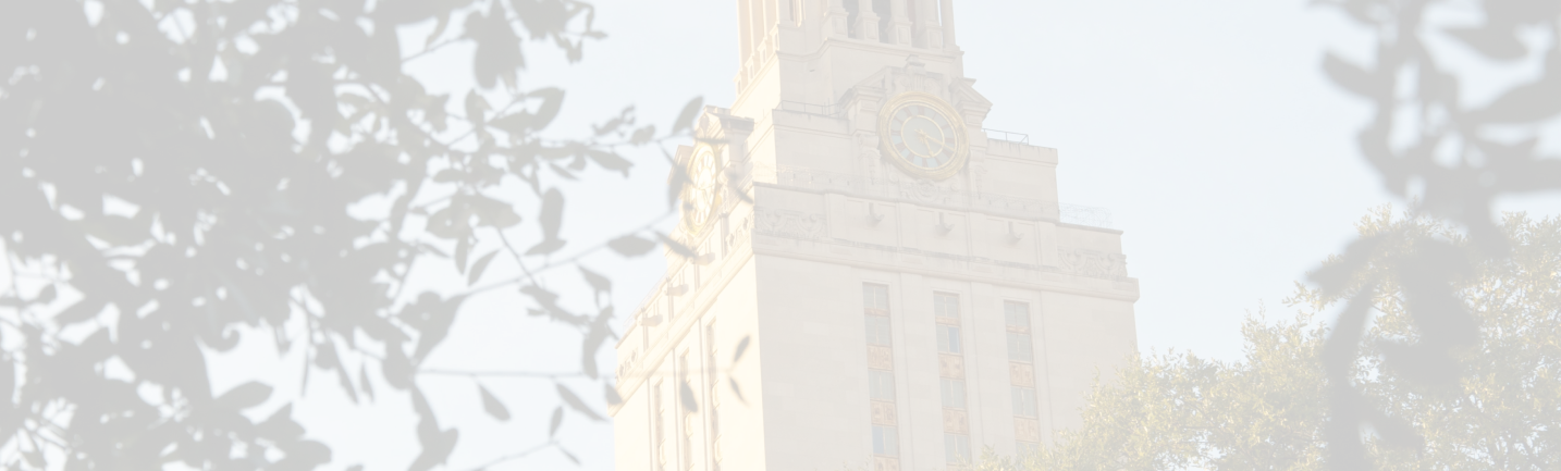 UT Tower as seen through tree leaves and spring blossoms